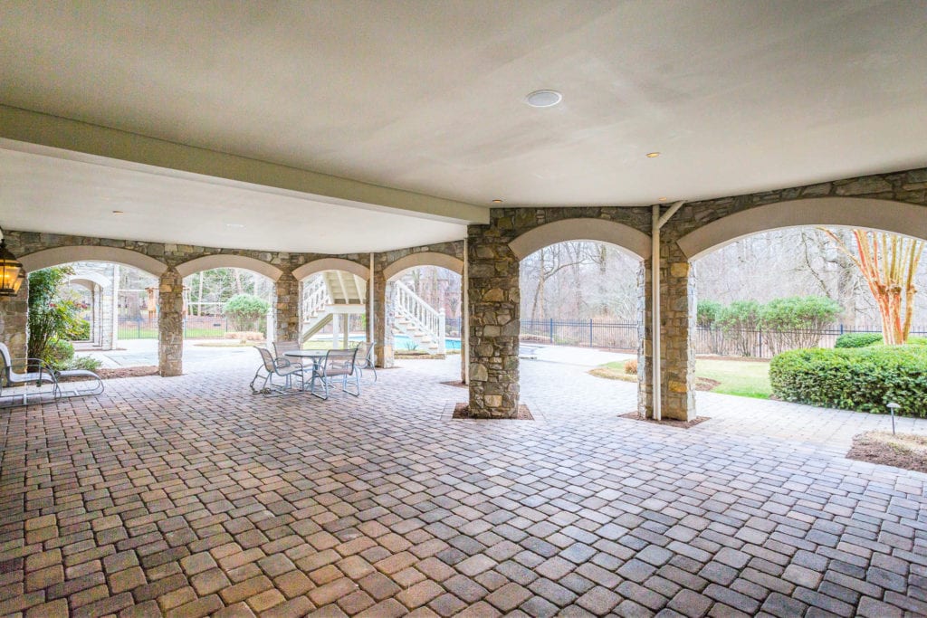 1650 Masters Run - Exterior of Mansion Stone Patio Facing to Yard, Closer View