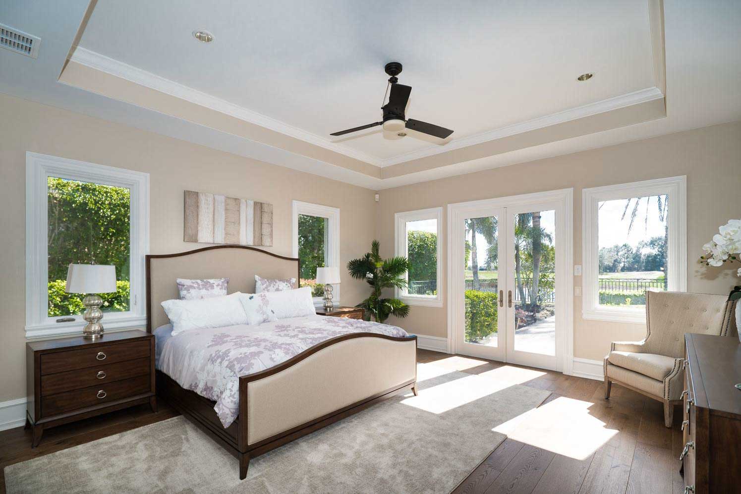 16770 Prato Way - Interior of Mansion Bedroom with French Door Exit to Backyard