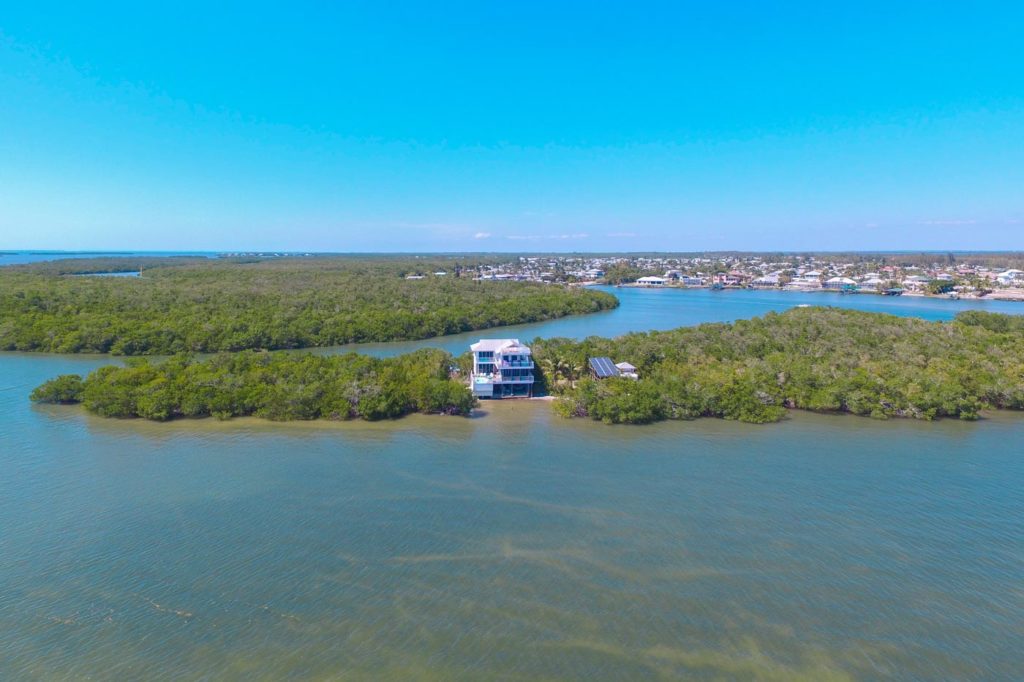 1 Crescent Island - Drone View of Estate and Property from Ocean, Closer View